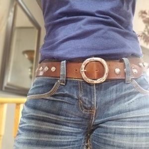 Genuine leather belt with metallic rivets